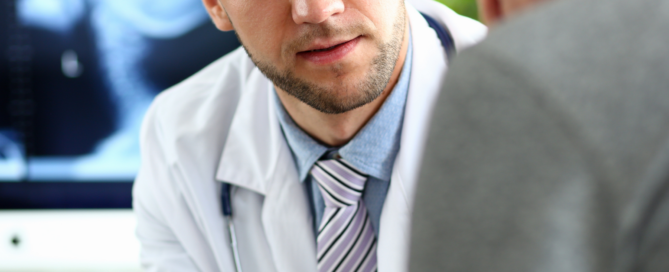 A Doctor talking with a male patient about what disqualifies you from being a sperm donor